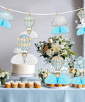 Blue hot air balloon honeycomb centerpieces for tables with clouds travel adventure theme 8 piece set in party setup