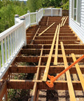 Heavy Duty Pallet Breaker With 48 Inch All Steel Handle Built Tough Fully Welded Pallet Buster Industrial Deck Board Removal Tool in use on a wooden deck frame.