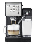 Super Sleek Programmable Espresso And Cappuccino Maker Featuring Automatic Milk Frother And 19 Bar Pump Stainless Steel Build brewing coffee in a clear cup.