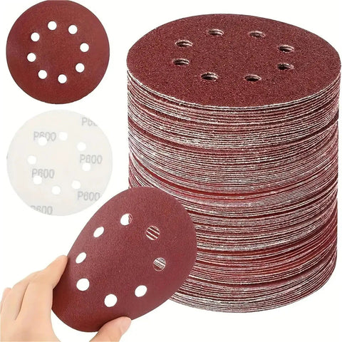50 Pcs 5 Inch 125mm Wet Dry Sanding Discs With Eight Holes For Wood Metal Polishing And Surface Smoothing Tasks stack of abrasive discs