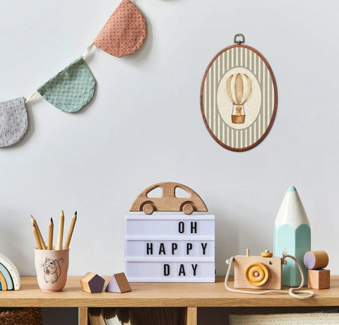 Vintage Cute Golden Retriever Nursery Oval Wall Art With Gray Striped Hot Air Balloon Framed Canvas Prints in playroom