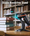 1D 2D QR Barcode Scanner Wireless And Wired With Battery Level Indicator And 2000mAh Battery Portable Handheld Barcode Reader With Stand Plug And Play Model D5100Z on a desk with books and a stand
