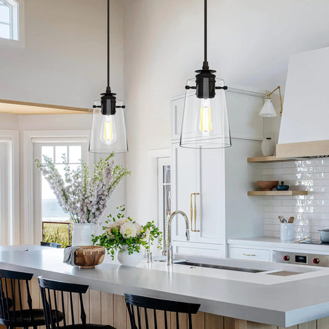 Black Pendant Lights For Kitchen Island, Modern Glass Hanging Fixture with thickened shade in a bright kitchen.