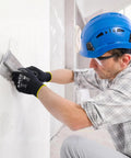 Worker applying plaster, wearing Lightweight Seamless Knit PU Coated Work Gloves For Men And Women With Smooth Palm Grip 13 Gauge Polyester.