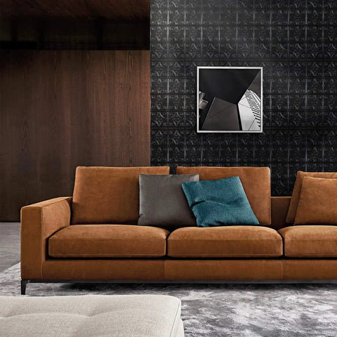 Living room with brown sofa and black accent wall featuring Tin Wall Tiles 24x24 Nail Up Black 5 Pack for Backsplash Ceiling and Stair Risers