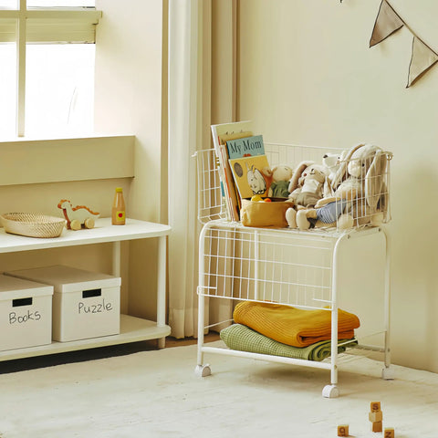 Rolling Laundry Basket With Wheels And Brakes in white wire, filled with toys and books, showcasing visible storage space with mesh shelves.