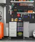 Beefy Metal Garage Storage Cabinet On Wheels With Lockable Drawer And Shelves below a tool wall, garage setting