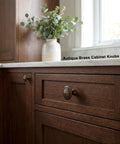 Antique Brass Cabinet Knobs 10 Pack Tough As Nails Heavy Duty Zinc Alloy Round 1.4 Inch Dia on wooden kitchen cabinet