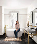 Modern bath featuring Colinet Brushed Gold Hand Towel Ring For Your Bath Easy Mount No Fuss Install Durable Satin Finish Coordinates With Colinet Faucets Adds Subtle Luxury And Flexible Placement In Any Space