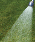 Gentle mist from 2000-Hole Aluminum Garden Hose Nozzle Replacement For Watering Wand on green lawn