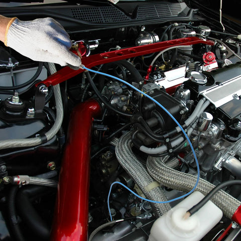 VASTOOLS blue 28in thin flexible magnetic pickup tool, side view in a car engine bay.