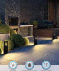 LED Low Voltage Pathway Lights Pack Of 4, 12V AC/DC Landscape Lighting With Anti Glare Dual Side Glow illuminating a modern outdoor patio