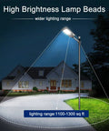 Outdoor Solar Street Light Dusk To Dawn With 3 Modes Motion Sensor illuminating driveway and house at night.