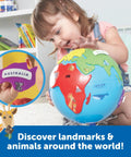 Child playing with Hands On 3D Puzzle Globe For Kids Learn World Geography with color coded continents and detachable pieces.