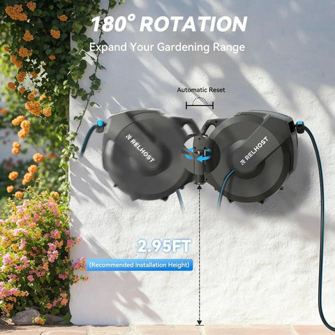 Retractable Garden Hose Reel Workhorse 1/2 Inch x 100 Ft, wall-mounted on a white wall with 180-degree swivel feature in garden setting