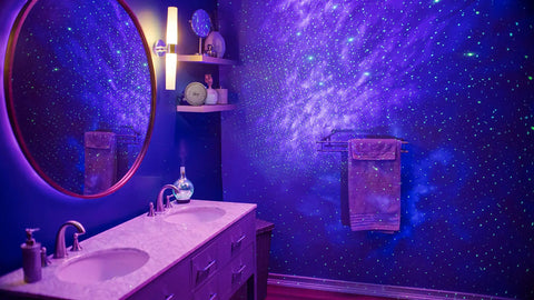 Bathroom illuminated by Sky Lite LED Laser Star Projector with Green Stars and Blue Nebula Cloud, creating mood lighting atmosphere.