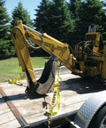 Beefy Heavy Duty 3 Inch By 30 Foot Ratchet Tie Down With Chain End And Grab Hook securing construction equipment on trailer