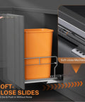 Premium Slick Under Cabinet Trash Pull Out Organizer Rack With Silent Soft Close Slides For Space Saving Kitchen Layout, orange bin shown.