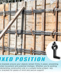 Construction site with iron beams and 8 Pack Concrete Screed Brackets For Screed Bars And Lumber Beefy Iron Construction Corrosion Resistant Built For Durability Ideal For Professional Concrete Floors DIY Projects And Tough Job Sites.