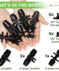Hands holding Drip Irrigation Fittings Kit 5/16 To 1/4 Inch Connectors Set, showing barbed tee, splitter, and end plugs.
