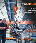 Heavy Duty Electric Chain Hoist With 1100 Lbs Half Ton Capacity And 110 Volt 20 Foot Lift No Sweat Operation For Home Garages Includes Wireless Remote And Badass G80 Chain lifting machinery in industrial setting.