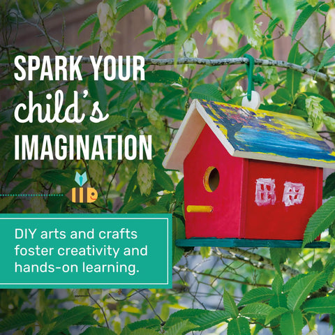 Red and blue wooden birdhouse hanging from a green tree branch showcasing Build A Birdhouse Bungalow DIY Kit For Kids With Seven Wooden Pieces.
