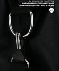 Close-up of stainless steel D-rings on collapsible mesh snorkel bag for long fins with top opening and hands-free carry.