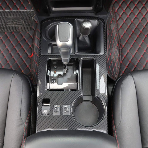 Dope ABS Carbon Fiber Gear Panel And Shifter Console Upgrade Revamps Your Toyota 4Runner Ride With Fresh Cockpit Trim And Slick Transmission Shield For 2010 To 2026 Models, featuring a close-up of gear shifter and console design.