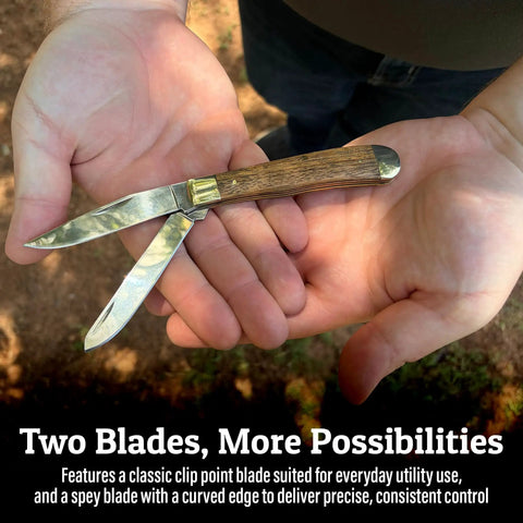 Scout Trapper Dual Blade Pocket Knife 3-Inch Clip Point And 3-Inch Spey Blades in hand, polished stainless steel, zebrawood handle