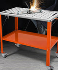 Rugged 36 By 18 Inches Welding Table On Wheels With 1200 Pound Load Capacity Portable Metal Workbench With Locking Brakes shown in use