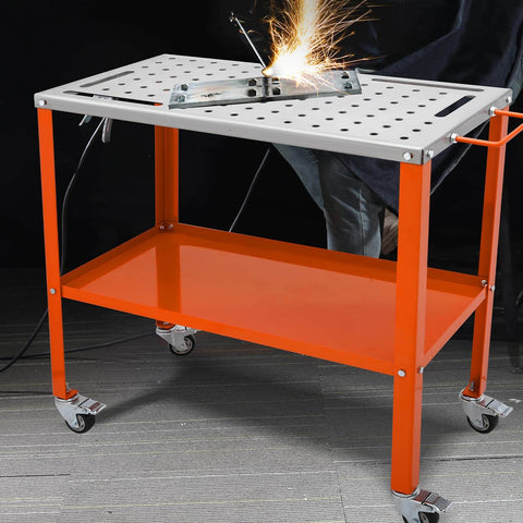 Rugged 36 By 18 Inches Welding Table On Wheels With 1200 Pound Load Capacity Portable Metal Workbench With Locking Brakes shown in use