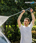 Man using Pressure Washer Gun With 360 Degree Swivel Heavy Duty Labor Saving for car cleaning outdoors.