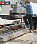 Heavy Duty Aluminum Truck Step Deck Ladder For 54 To 66 Inch Trailer Beds, 72 Inch Long Yet Lightweight At About 20 Pounds, 375 Pound Capacity, Folds Upright For Easy Storage On Jobsites, worker climbing trailer