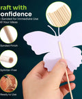 Premium Birch Wood Dowel Rods One Eighth By Six Inch Round Craft Sticks Featuring Slick Splinter Free Finish in use for crafting a butterfly.
