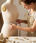 Tailor using Soft Body Measurement Tape With Dual Scale 60 Inch And 150 Cm Non Stretch Flexible Tape on mannequin in studio