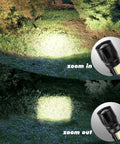 4 Pack Rechargeable Zoomable Mini Clip On Flashlights With Side COB Light USB C Recharge 500mAh Battery Super Lightweight EDC Lanterns showcasing zoom feature in a forest setting