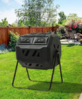 Outdoor garden showing 45 Gallon Rotating Compost Tumbler Bin With Large Dual Chamber, Animal Proof Sliding Door on lawn