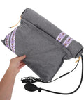 Super Cozy USB Inflatable Heated Neck Pillow With Washable Cotton Cover And Relaxing Aroma For Ultimate Work Travel Stress Relief And Healthy Posture Support in grey with decorative trim.