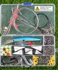 136 Piece Saltwater Tackle Kit For Surf Fishing With Lures And Rigs Hooks Leaders Swivels Sinker Weights Beads Snaps And More All In One Ocean Fishing Gear displayed in a clear plastic box on grass.
