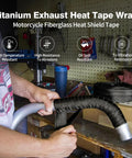 Person using Exhaust Heat Wrap Kit 2 Inch 16 Foot High Temp Fiberglass Header Wrap With Heat Shield Tape on pipe in workshop.