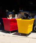 Commercial 16 Bushel Utility Cart With Steel Base And Poly Box Basket shown in red and yellow, loaded with items in a warehouse.