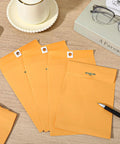 200 Pack 5 By 7 Inch Clasp Manila Envelopes With Gummed Closure 28 Lb Paper Yellow Office Mailer Envelopes displayed on desk