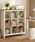 Hella Spacious Farmhouse Nine Cube Bookshelf With Heavy Duty Legs And Adjustable Shelves In Cloud White And Warm Brown in a cozy living room setting.