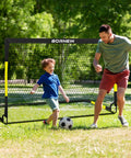 Child and adult playing soccer with Two Pack Easy Fold Portable Pop Up Soccer Goals 6x4 Ft Backyard Training Set.