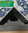 Close-up of rug corner with Eight Pack Non Slip Rug Pads With Reusable Double Sided Carpet Tape For Hardwood Floors And Tiles, Extra Thick 2mm Grid Adhesive That Grips Rug Fibers And Keeps Area Rugs From Shifting, No Residue.