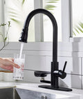 COXOVAY Pull Down Kitchen Faucet with Glass Rinser Single Handle Kitchen Sink Faucet with Pull Out Sprayer, Glass Rinser Faucet for Kitchen Sink 1 Hole or 3 Hole, Black pouring water into a glass.