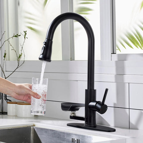 COXOVAY Pull Down Kitchen Faucet with Glass Rinser Single Handle Kitchen Sink Faucet with Pull Out Sprayer, Glass Rinser Faucet for Kitchen Sink 1 Hole or 3 Hole, Black pouring water into a glass.
