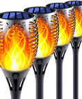 Four solar torch lights with flickering flame realistic fire effect for outdoor garden and patio setup, pack of four