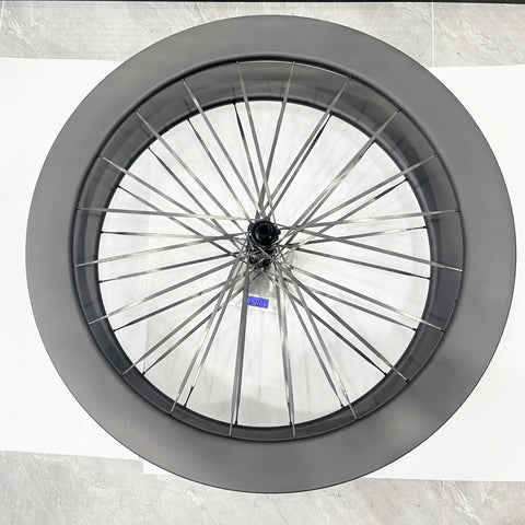 700c Carbon Road Bike Wheelset With Deep Section 60 65mm Aero Rims Matte Black Lightweight Spokes For Beast Mode Speed Reduced Drag Road Racing Performance, top view.