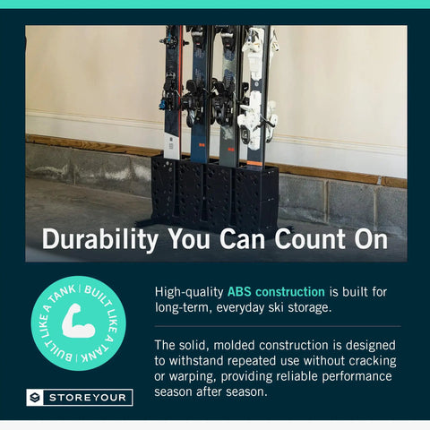 Telluride Freestanding Workhorse Ski Storage Rack in use, securing four pairs of skis in a garage setting.
